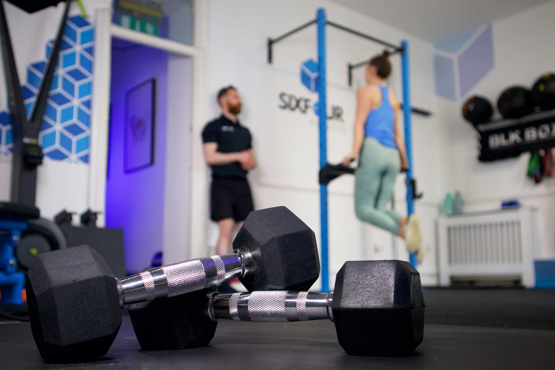 A small group of women training together at SixFour Fitness